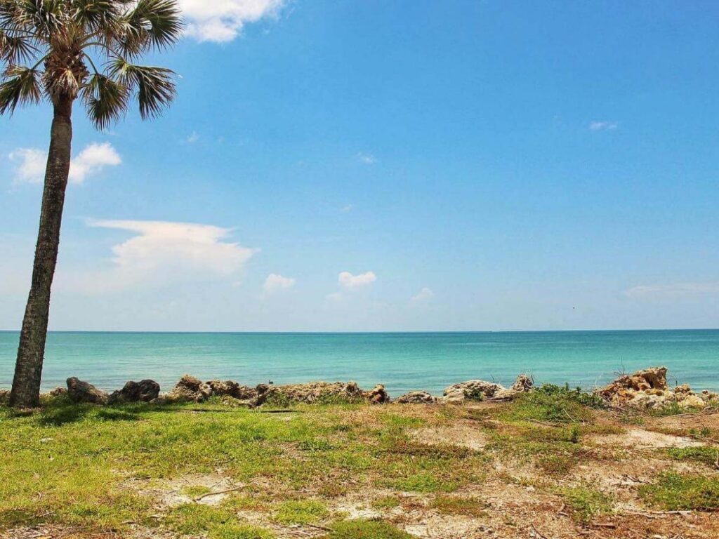 Calm evening at Crescent Beach in Sarasota with soft light and minimal crowds