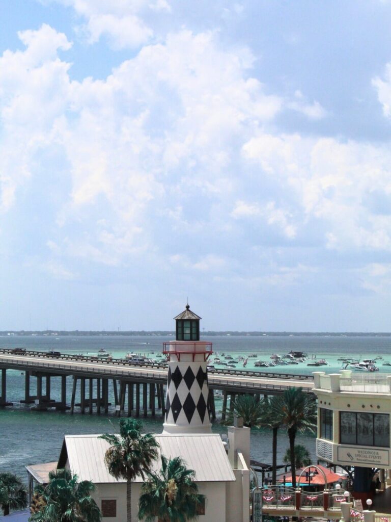 Visitors strolling along the Destin Harbor Boardwalk