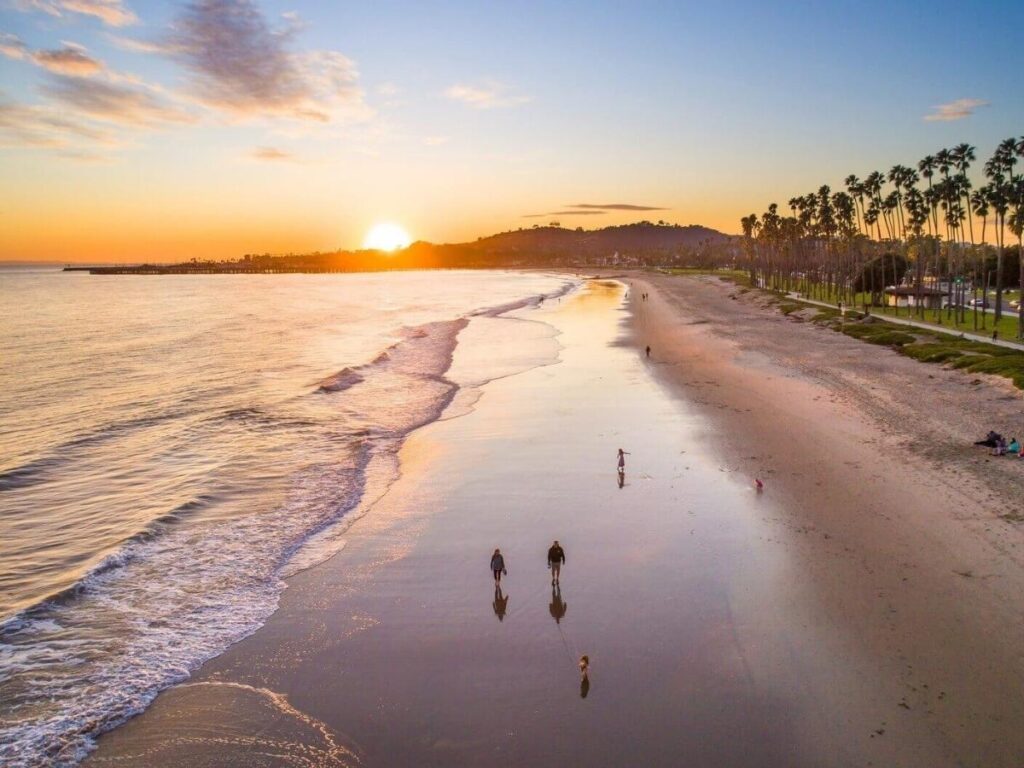 Wide sandy shoreline at East Beach in Santa Barbara on a clear day
