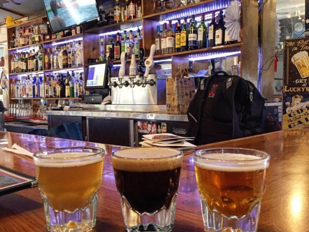 Outdoor brewery patio in Estes Park with mountain views.