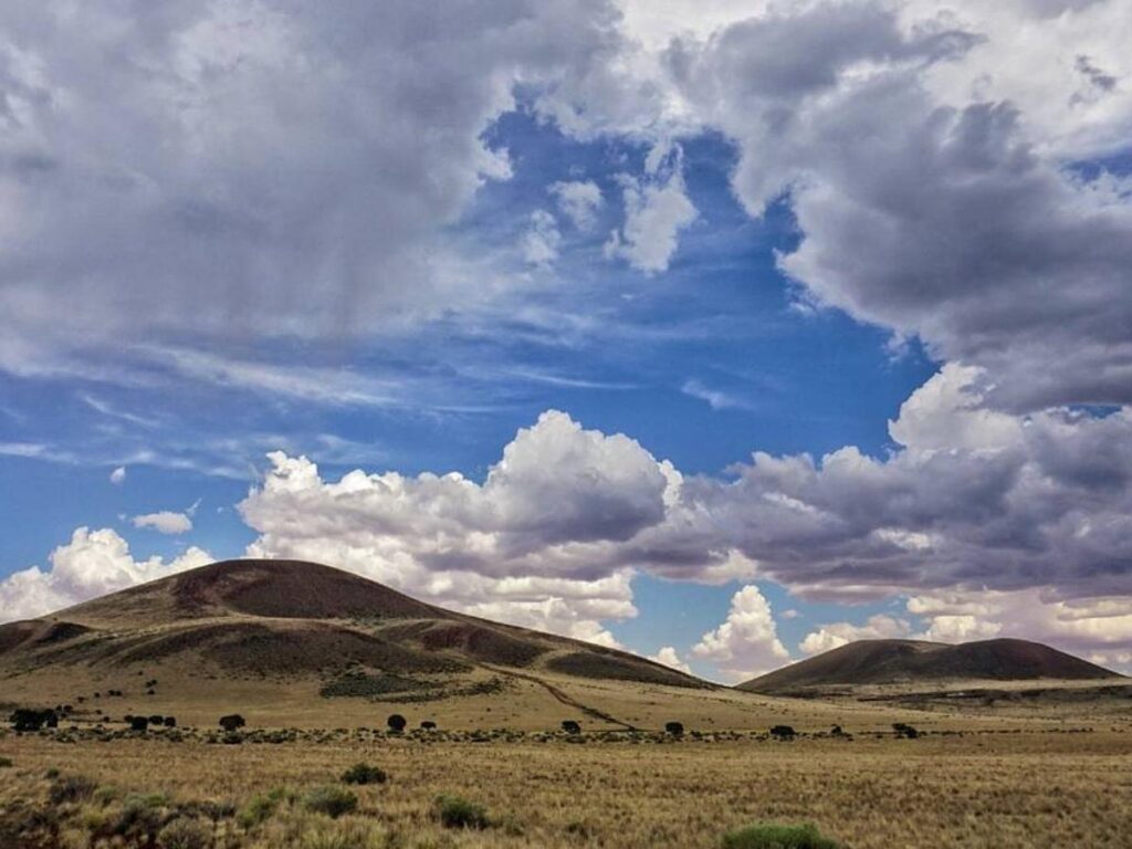 Sunset light over volcanic cinder cones near Flagstaff