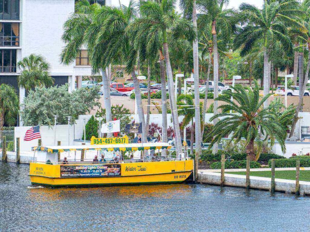 Fort Lauderdale water taxi cruising through city canals