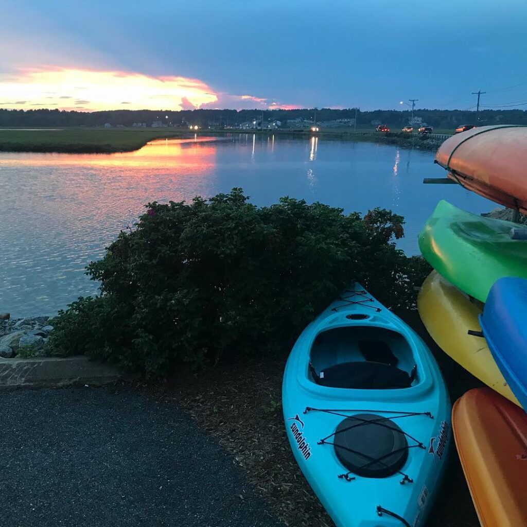 Kayaks at Myrtle Beach salt marsh at golden hour
