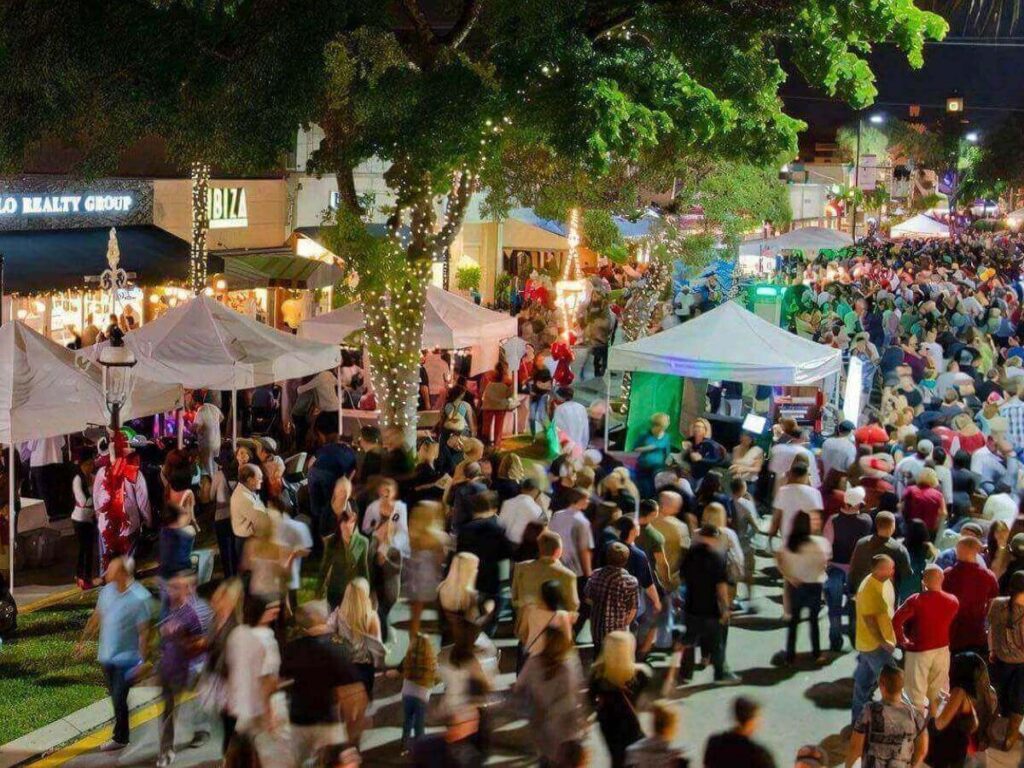 Las Olas Boulevard in Fort Lauderdale with outdoor dining and evening lights