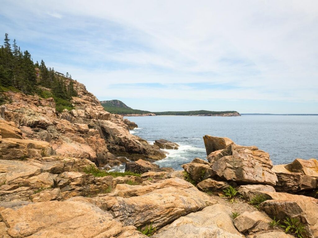 High sea cliffs and crashing waves at Otter Cliff in Acadia National Park