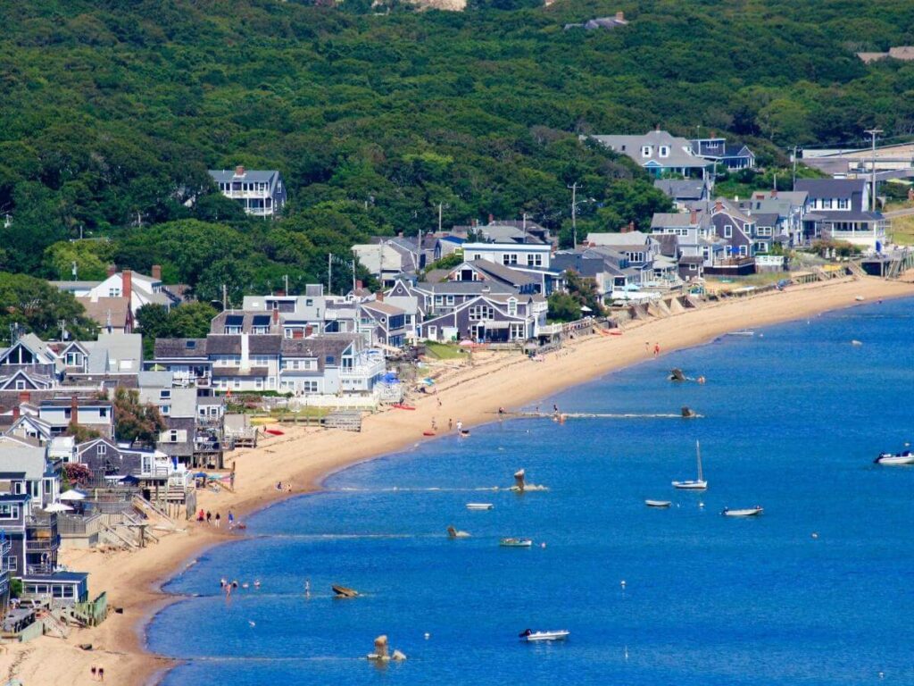 Quiet beach in Provincetown early in the morning with calm water and empty sand