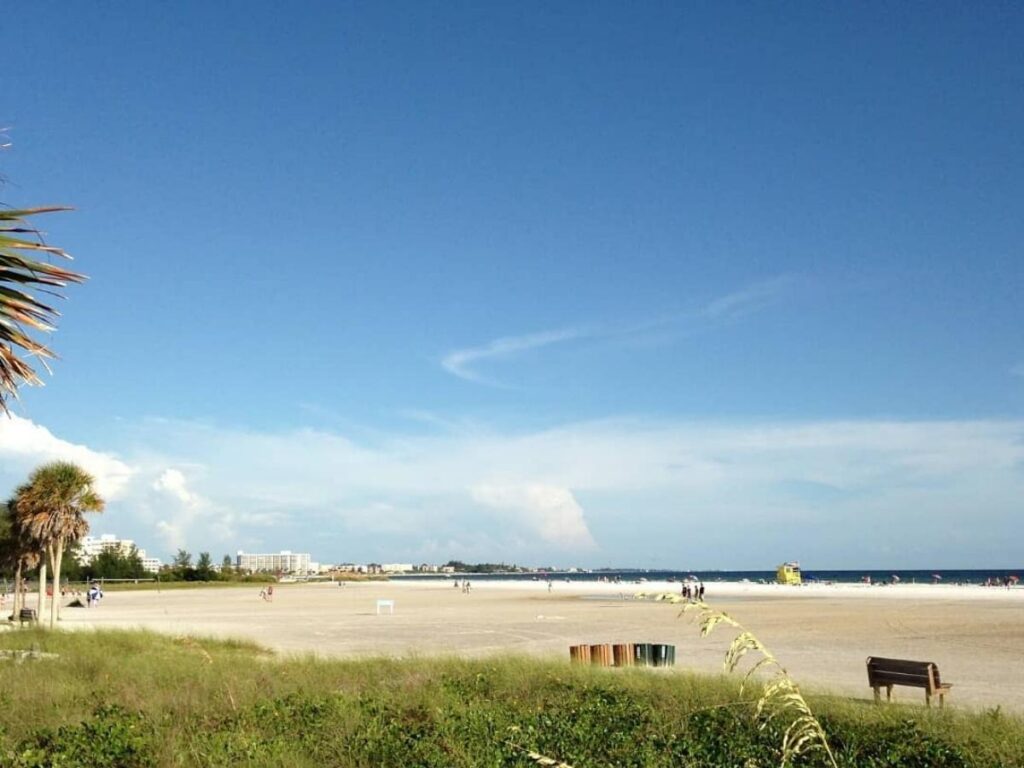 Quiet afternoon at a Sarasota beach with few people and gentle waves