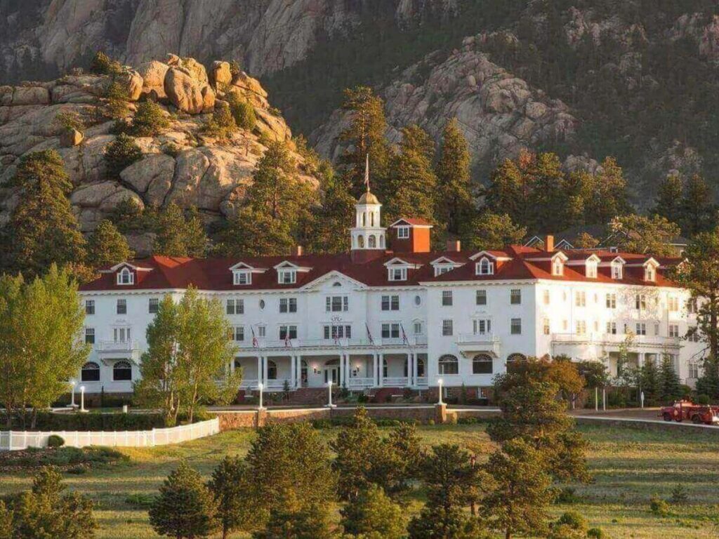 The historic Stanley Hotel with mountain views in Estes Park.