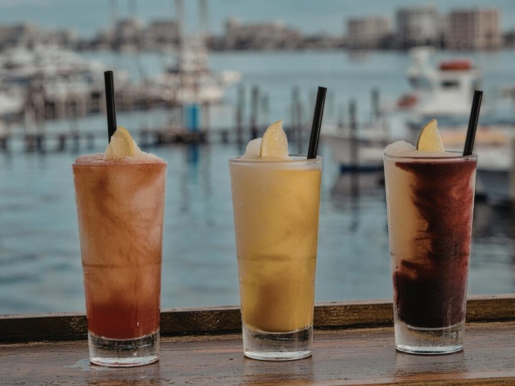 Drinks at sunset in Provincetown with harbor views and warm evening light
