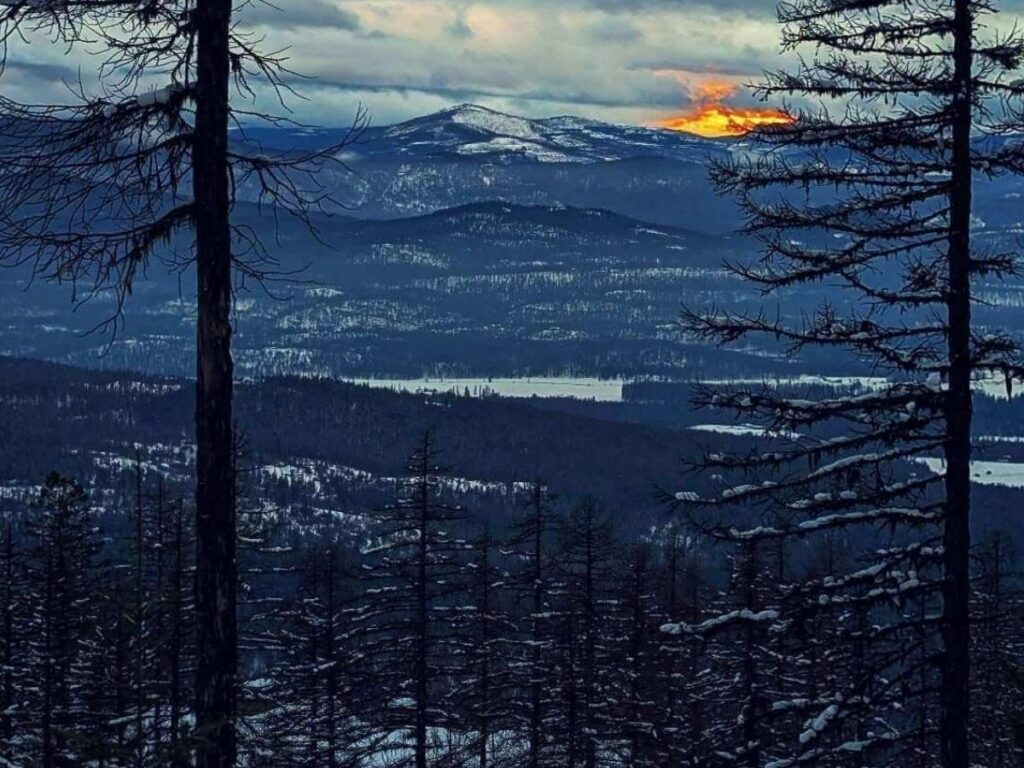 Sunset view in Whitefish, Montana with calm water and soft light