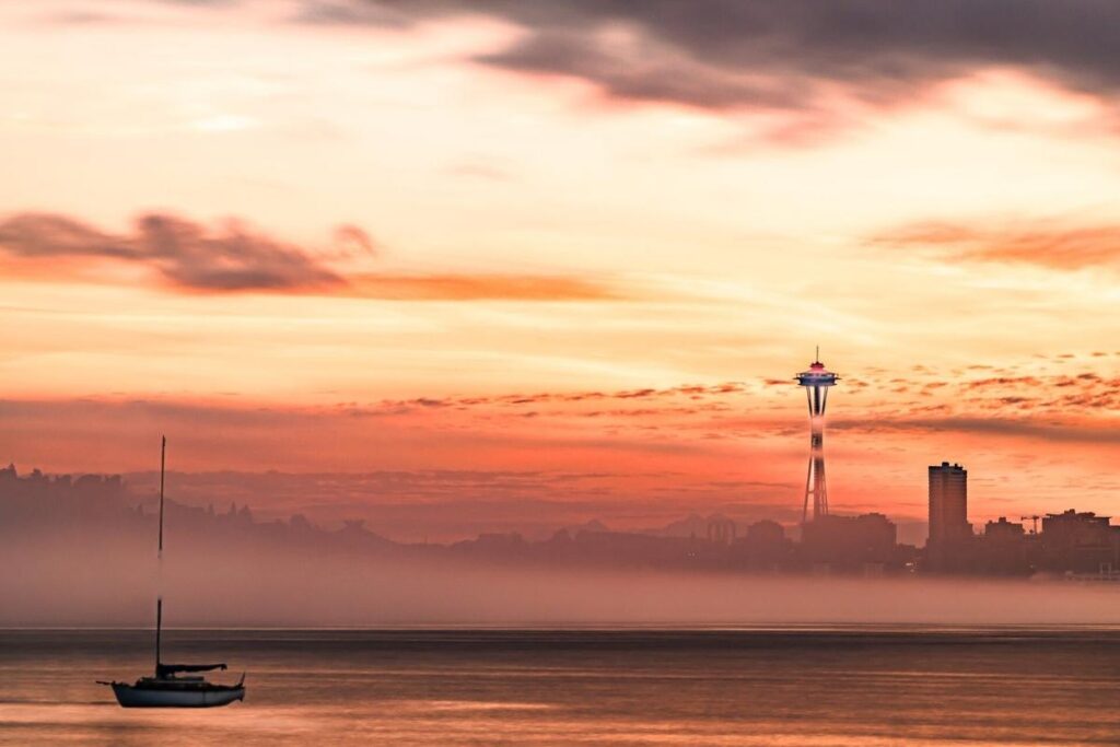 View of Seattle skyline from Alki Beach at golden hour