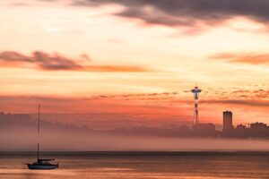 View of Seattle skyline from Alki Beach at golden hour