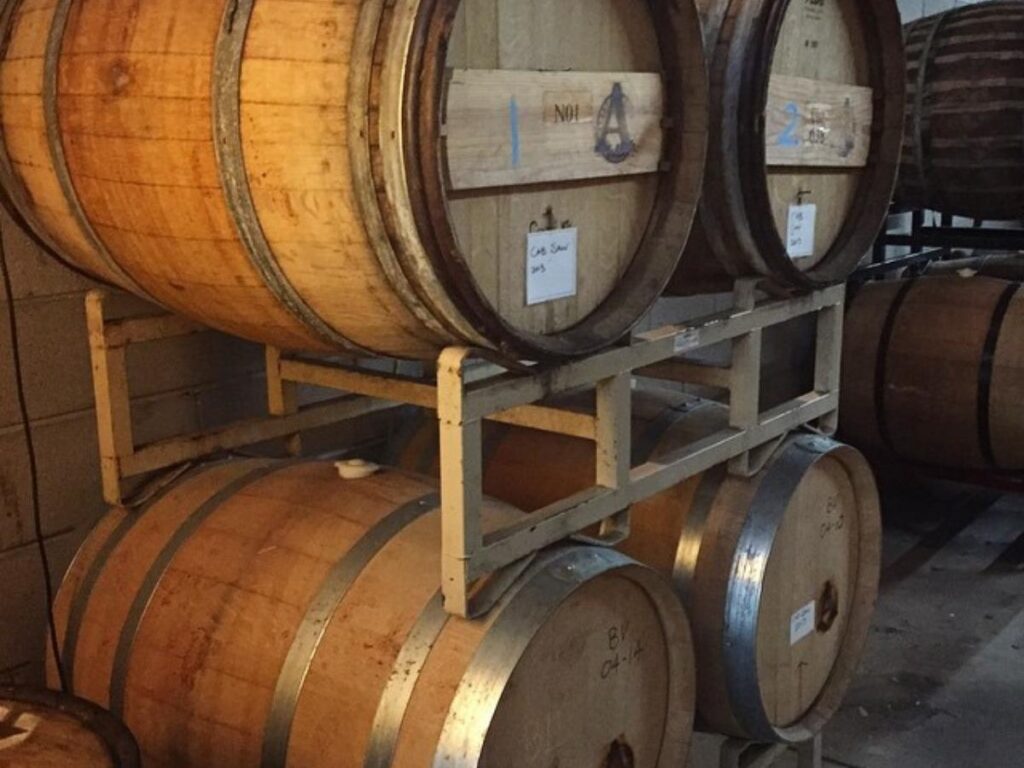 People relaxing with beers at Avery Brewing Company