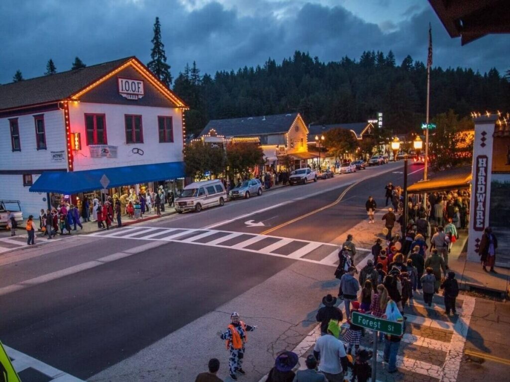 People walking along Boulder Creek Path in the afternoon shade.