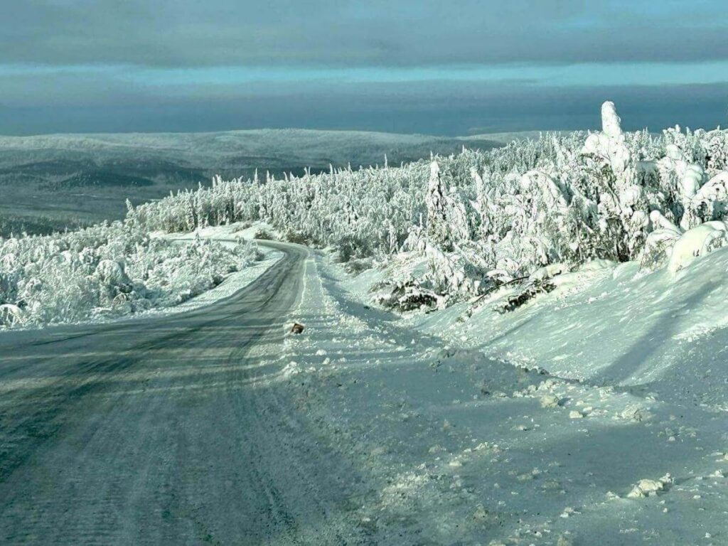 Snow-covered Dalton Highway leading toward the Arctic Circle from Fairbanks