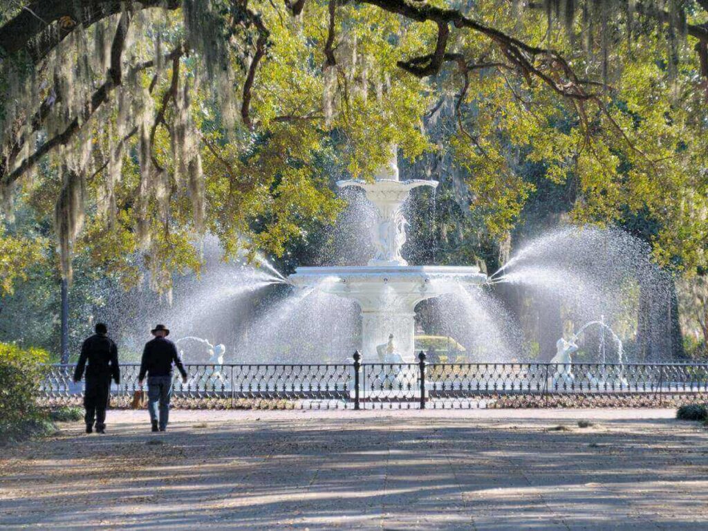 Forsyth Park in Savannah during a slow morning with people sitting and relaxing