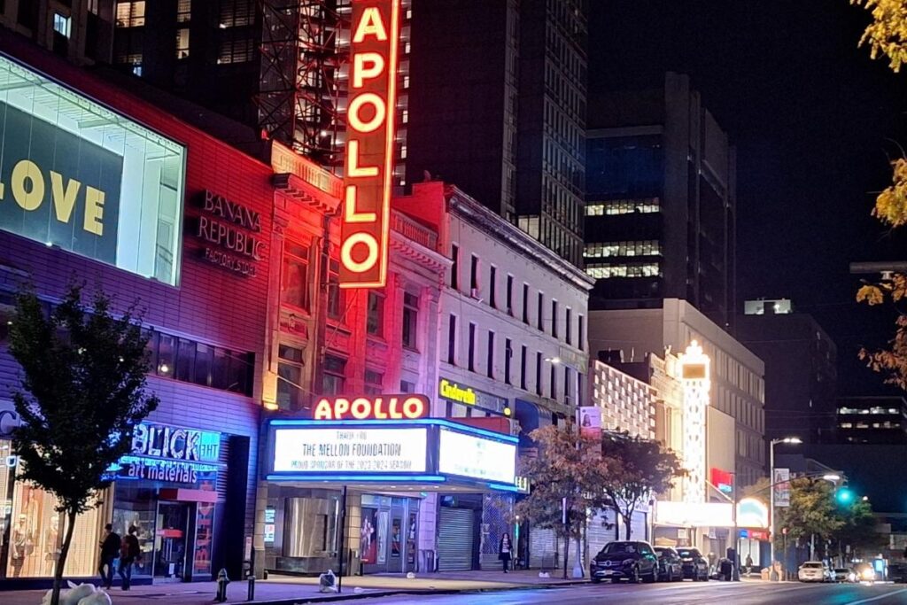 The Apollo Theater marquee in Harlem lit at night