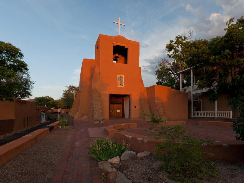 uiet interior of a historic church in Santa Fe
