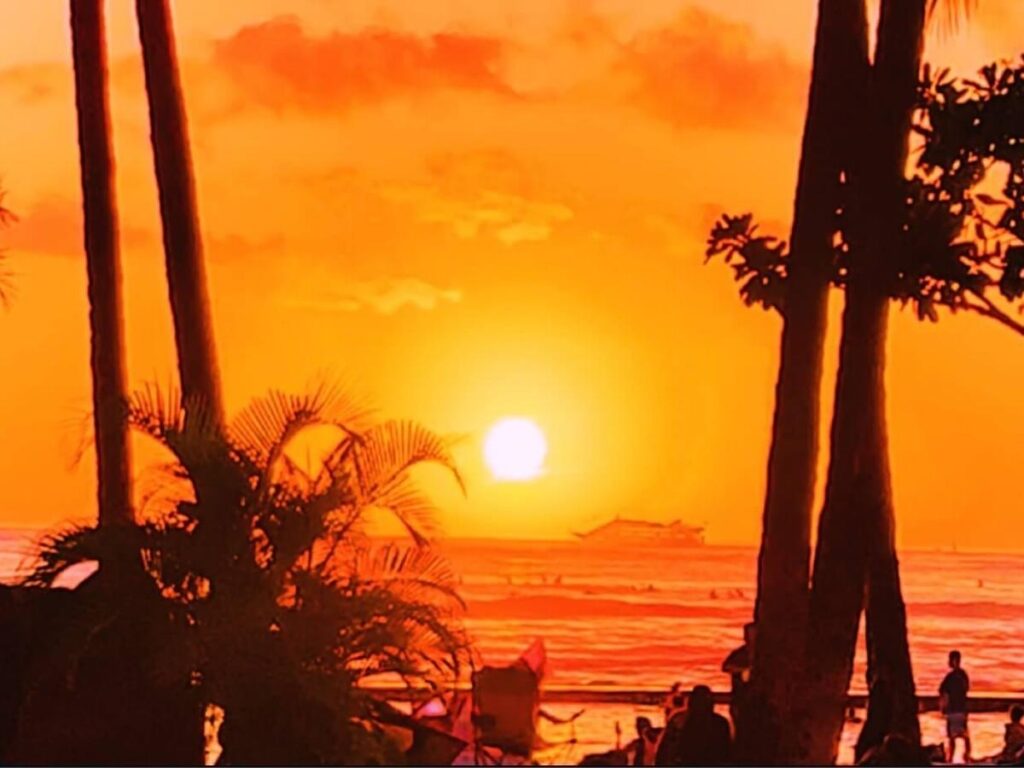 Sunset over Honolulu skyline and Waikiki Beach
