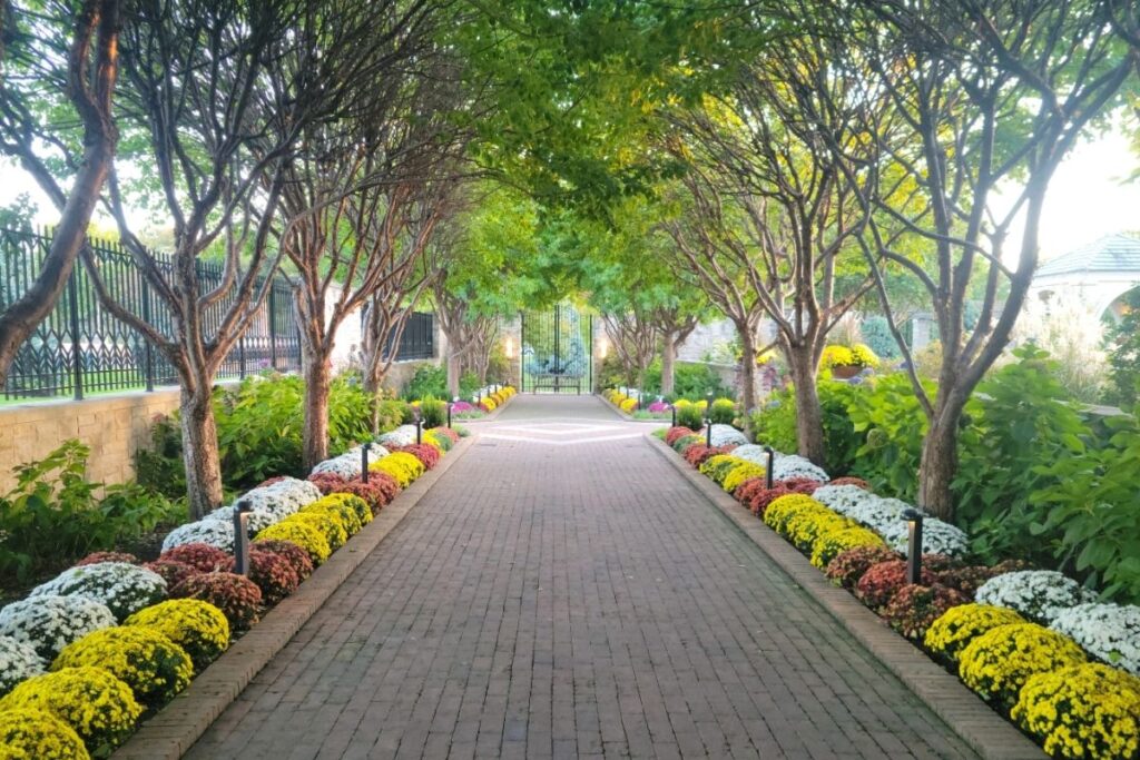 Floral arch and pathway at Kauffman Memorial Garden