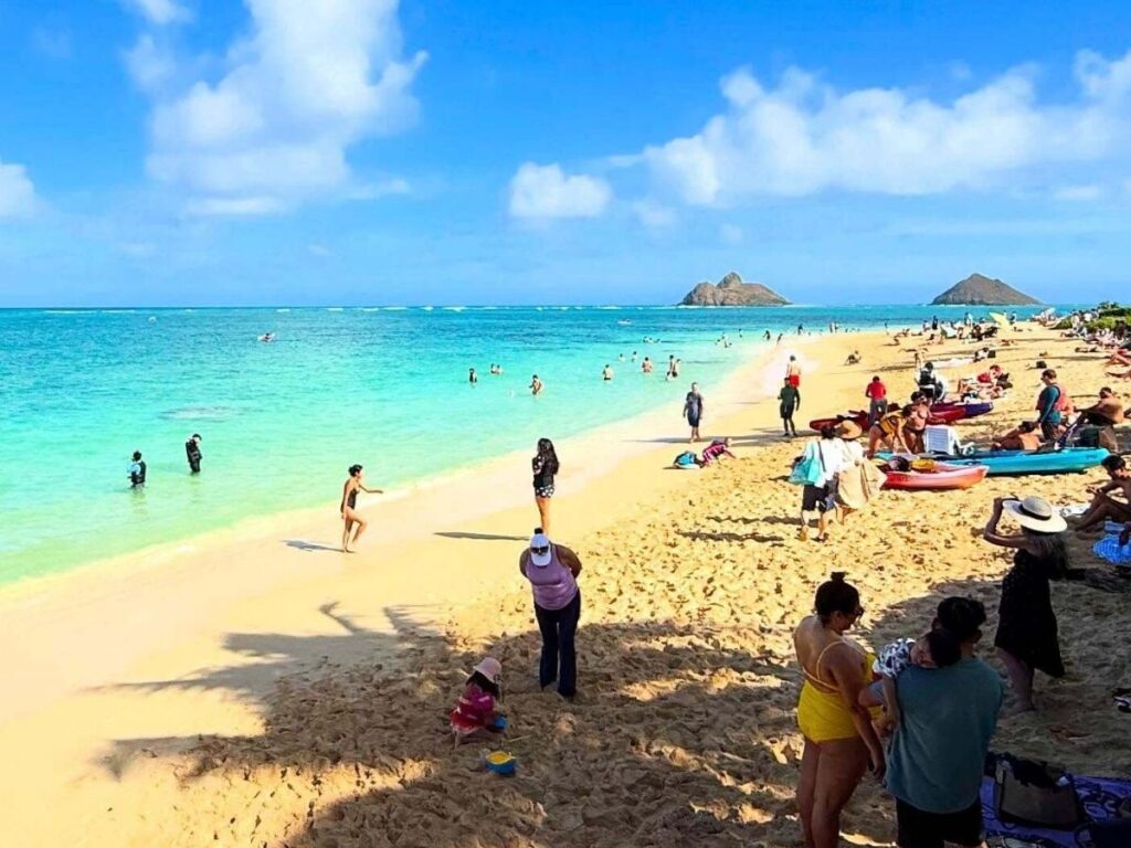 Lanikai Beach with soft white sand and the Mokulua Islands offshore on Oahu