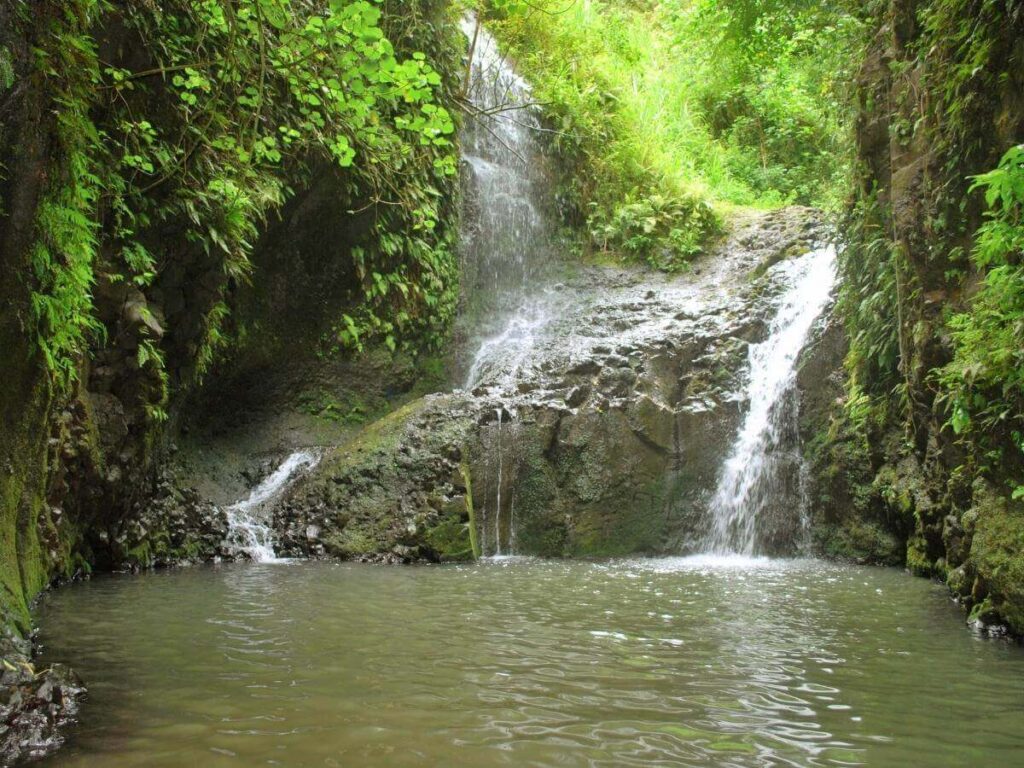 Maunawili Falls waterfall pool in Oahu rainforest