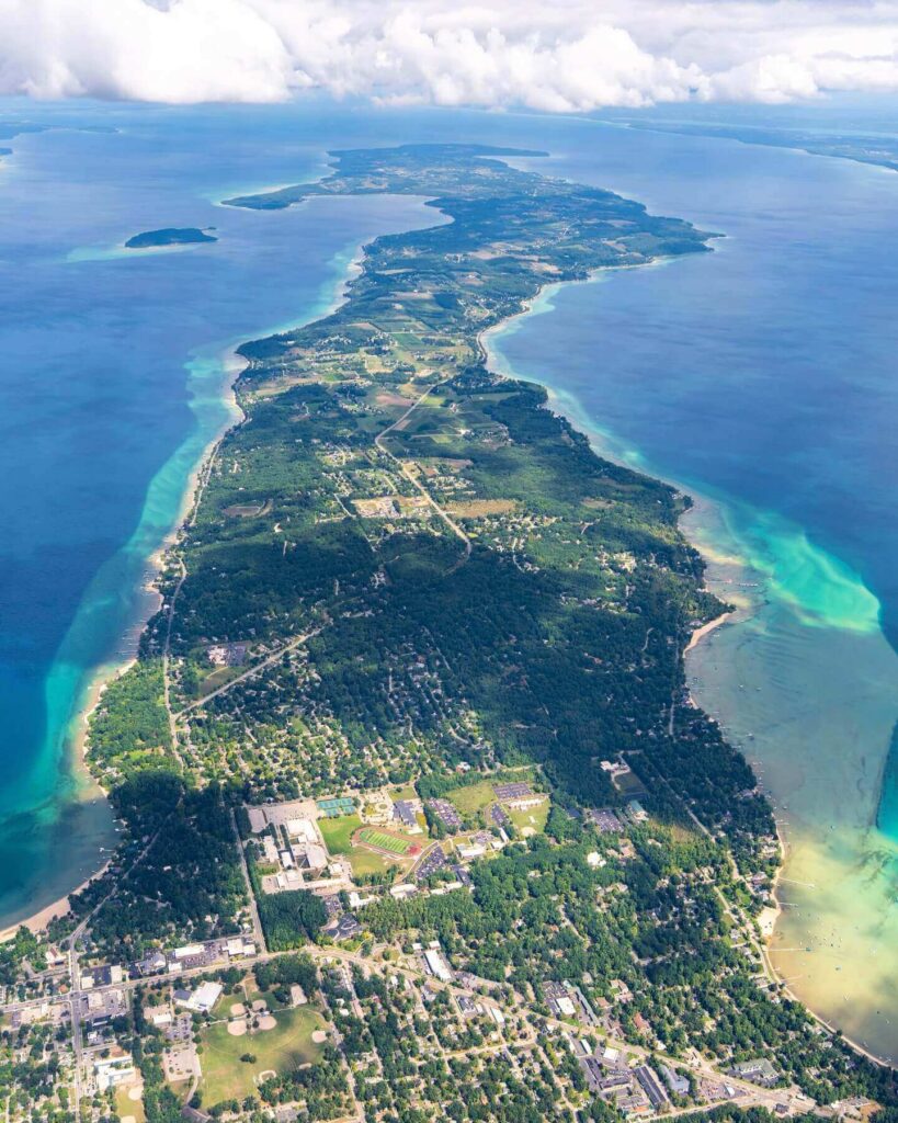 Scenic drive through Old Mission Peninsula with vineyards and bay views