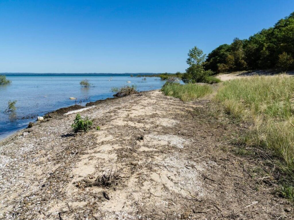 Scenic drive through Old Mission Peninsula with vineyards and lake views