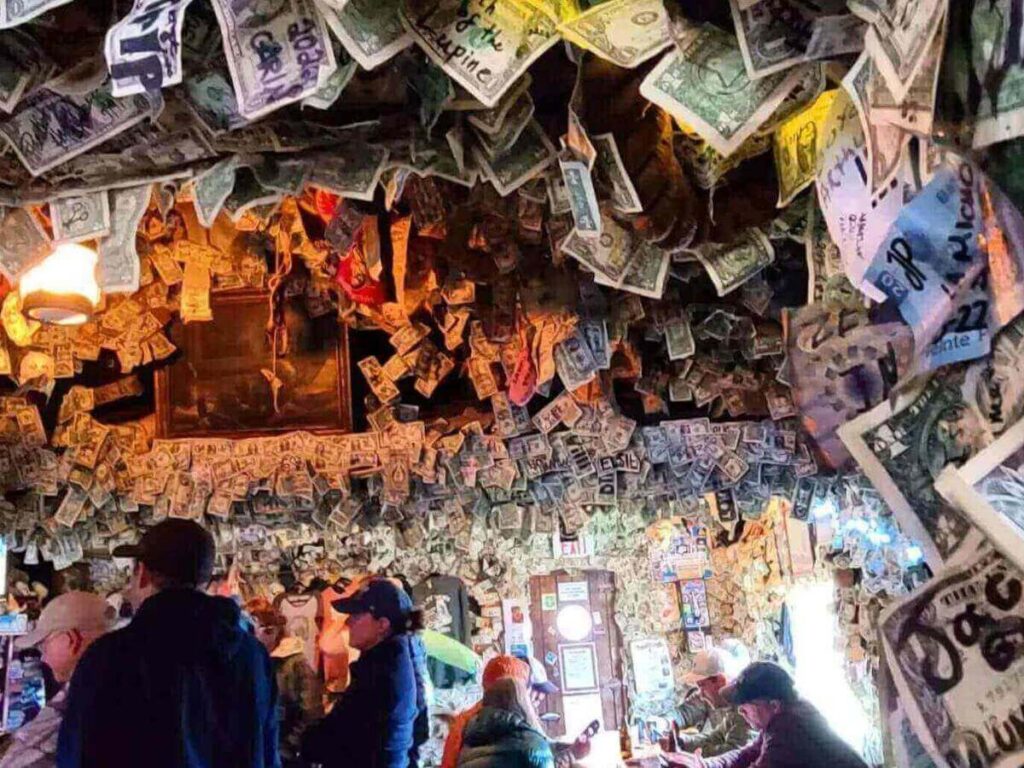 Salty Dawg Saloon on the Homer Spit with dollar bills covering the walls