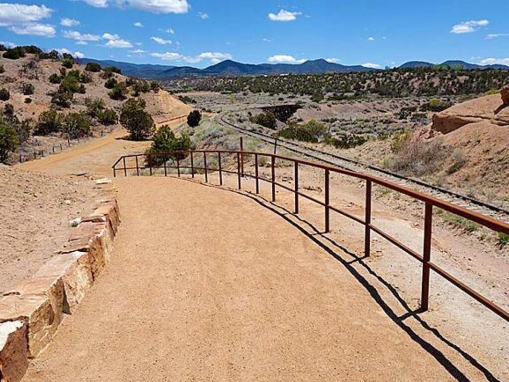 Open landscape and wide skies surrounding Santa Fe