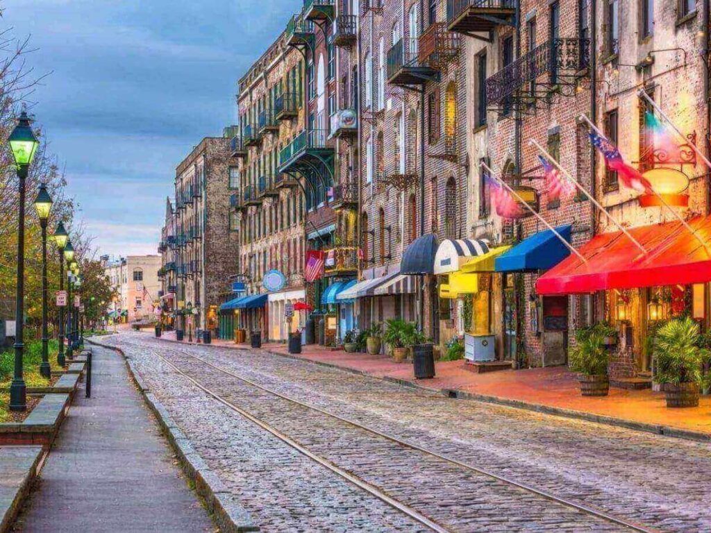 Early morning light filtering through oak trees in Savannah’s historic district