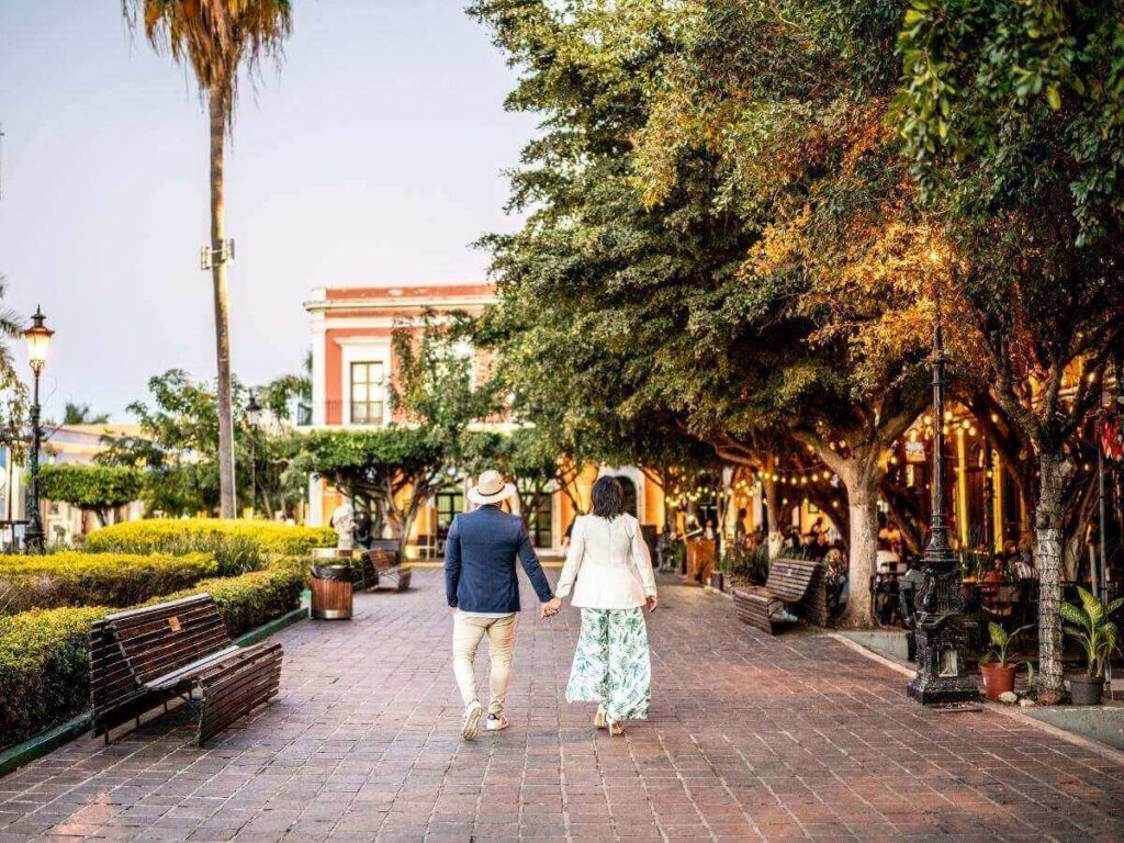 Quiet morning walk through Savannah’s historic district with oak trees and Spanish moss