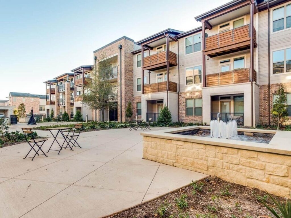 Savannah historic district square surrounded by classic homes and oak trees