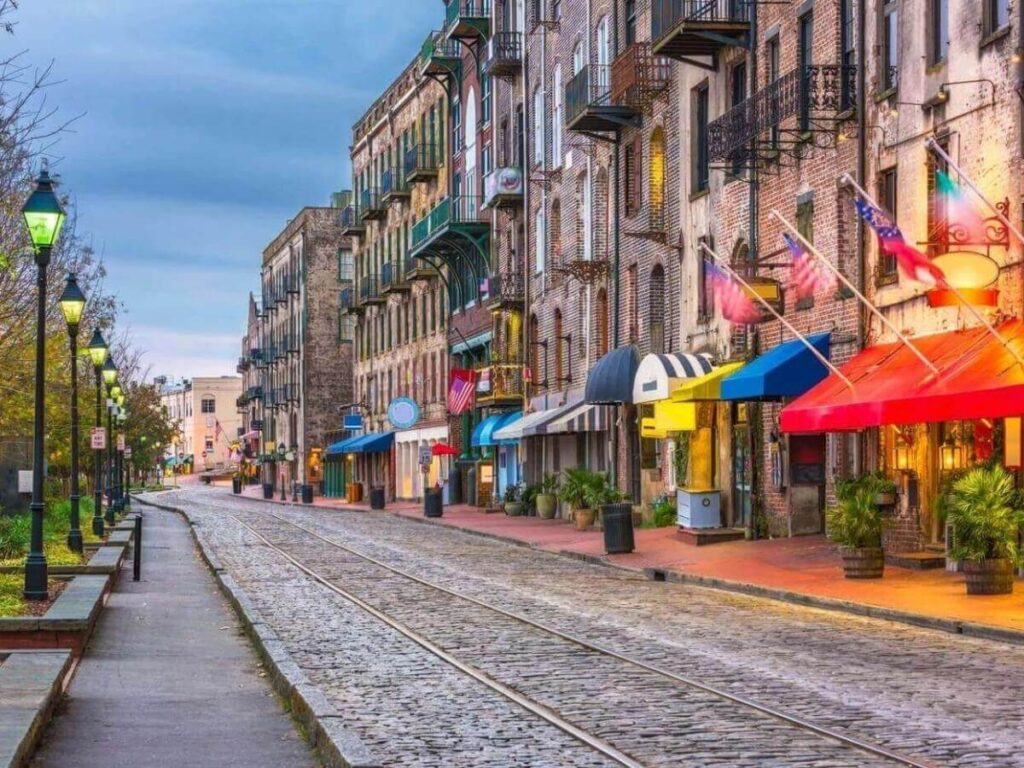 Quiet walk through a historic Savannah street with oak trees and old homes