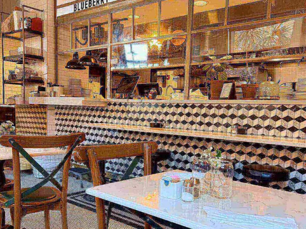 Cozy Savannah restaurant interior set for a long, relaxed dinner