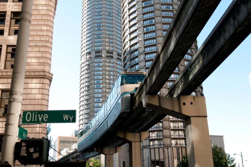 Seattle Center Monorail passing through downtown buildings
