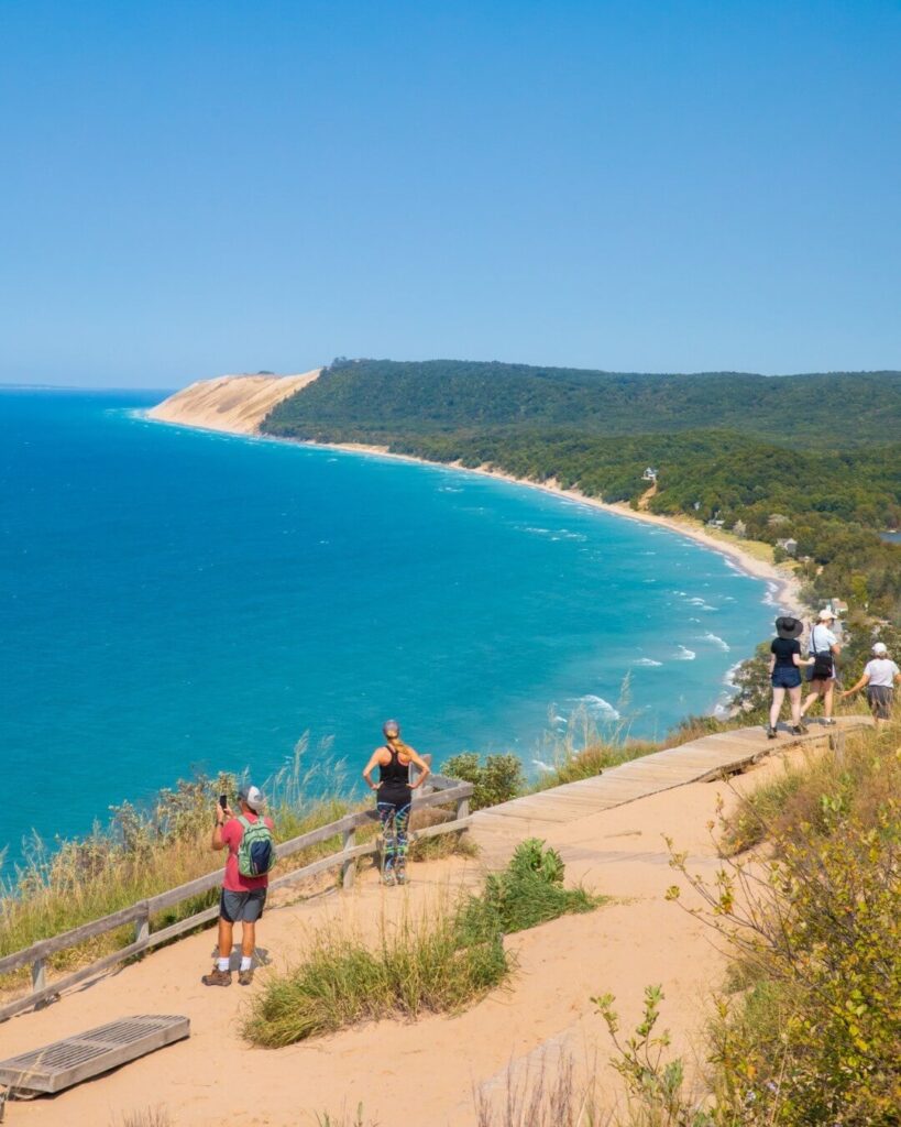 Visitors climbing the famous Dune Climb at Sleeping Bear Dunes