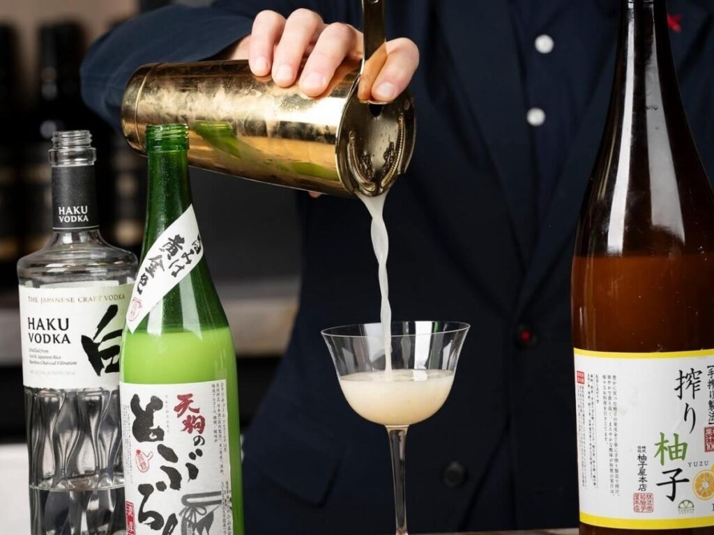 People enjoying drinks outdoors in Vail during summer