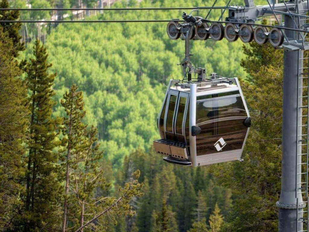 Gondola ride in Vail with soft morning mountain light