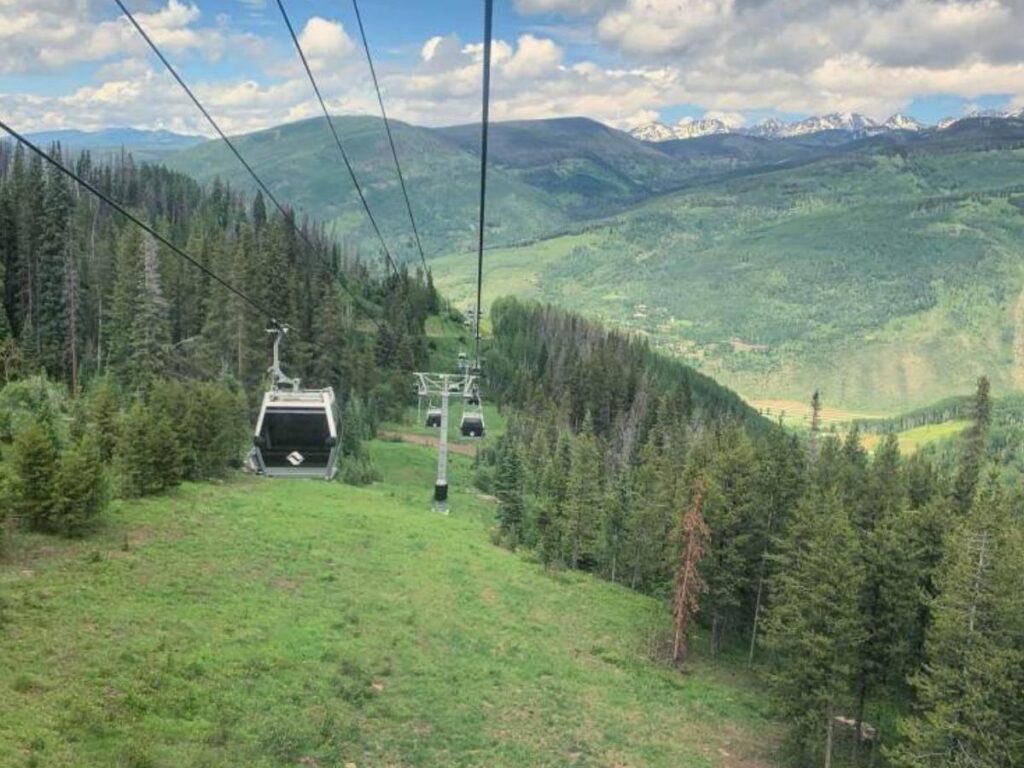 Gondola ride in Vail offering wide mountain views