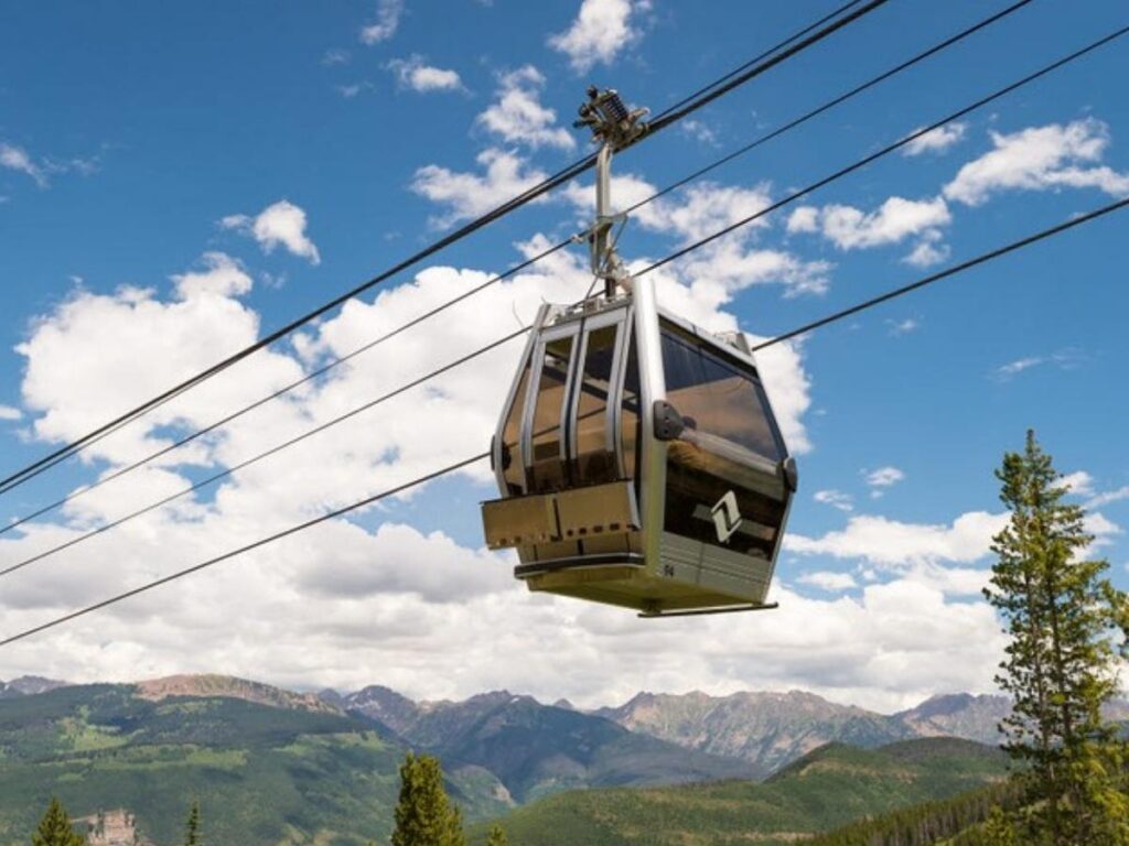 Gondola ride above Vail Village with mountain views in Colorado