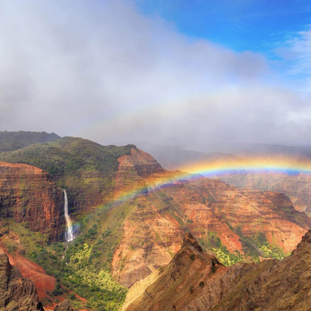 Colorful layered cliffs and deep valley of Waimea Canyon in Kauai