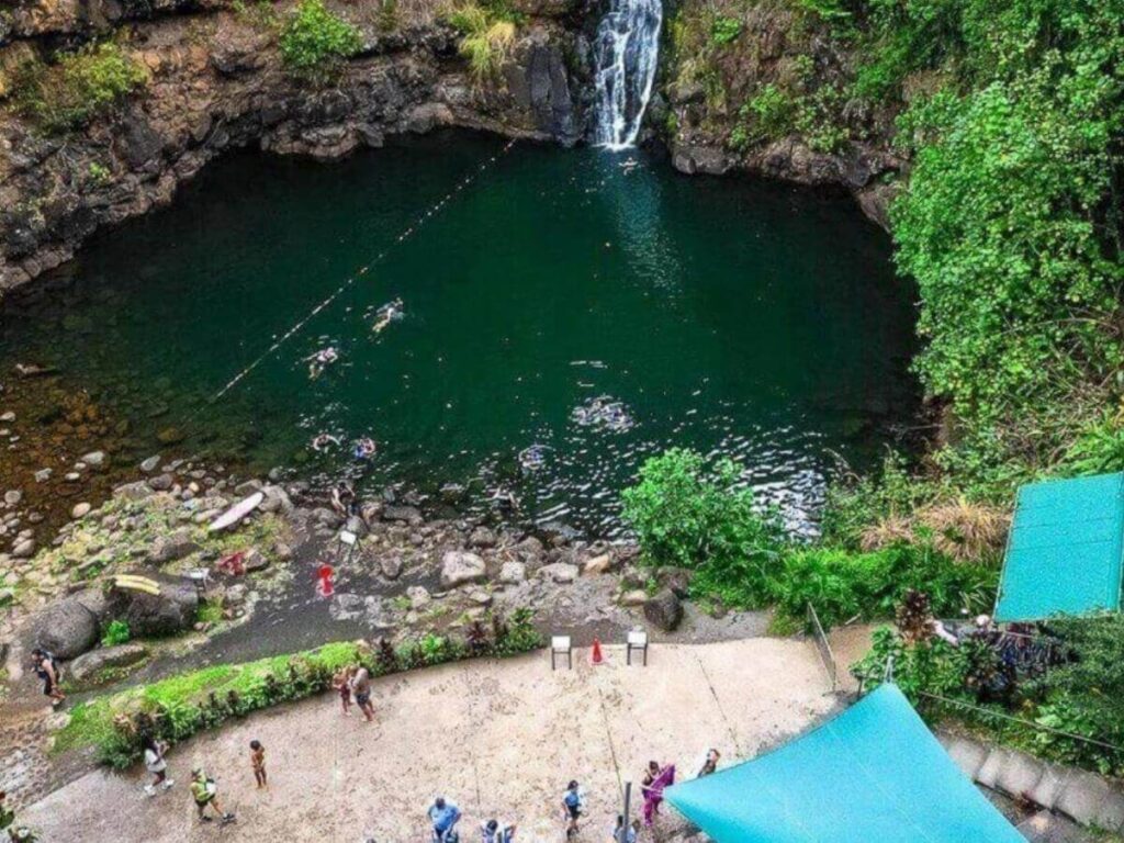 Waimea Falls in Waimea Valley with paved walking path