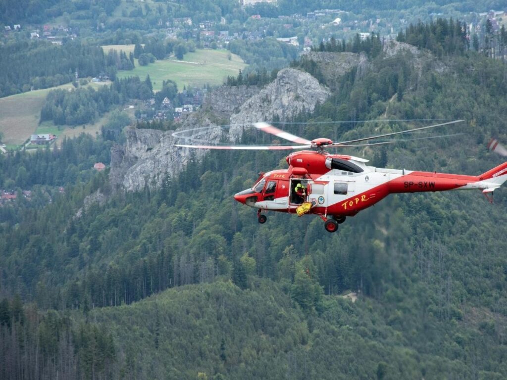 Helicopter flying over volcanic landscape on the Big Island of Hawaii