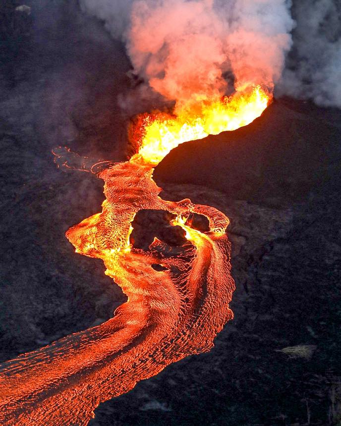 Driving through volcanic lava landscape on the Big Island of Hawaii