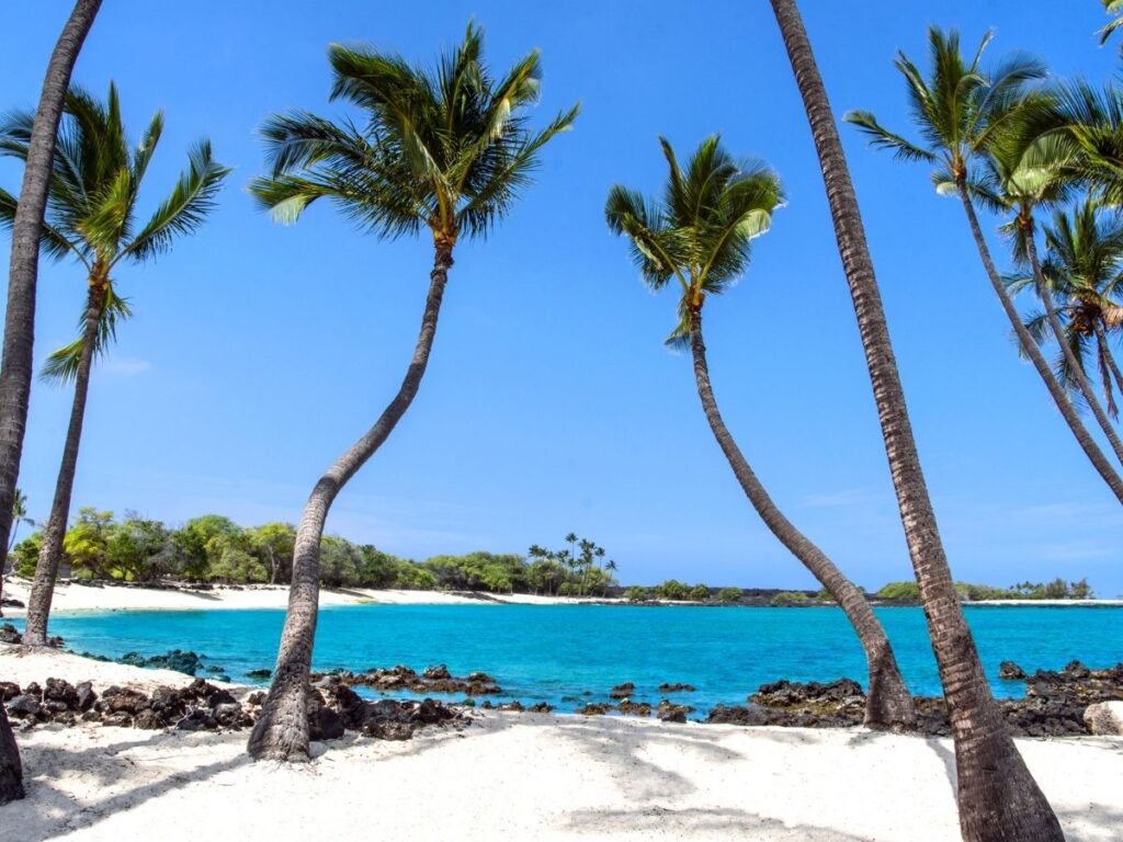 One Aliʻi Beach Park near Kaunakakai with calm water and shaded picnic areas