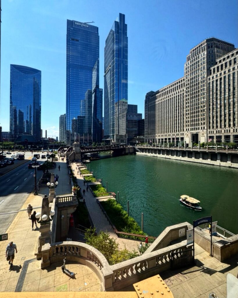 Morning walk along the Chicago Riverwalk with downtown skyline