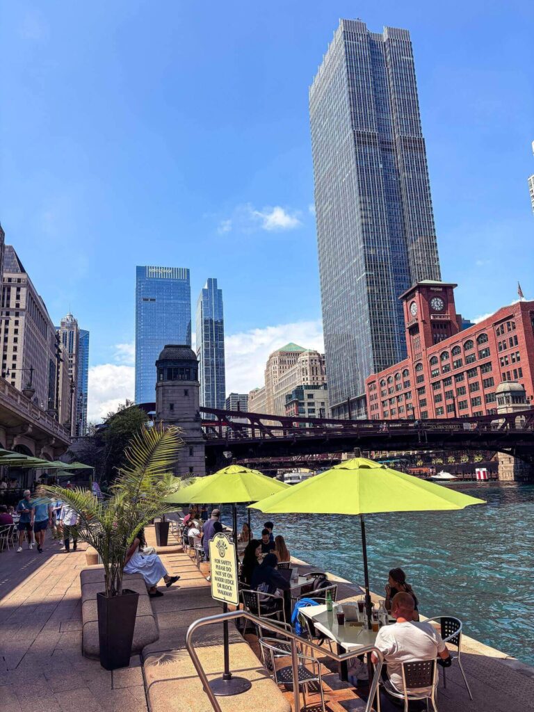People enjoying a sunny afternoon along the Chicago Riverwalk