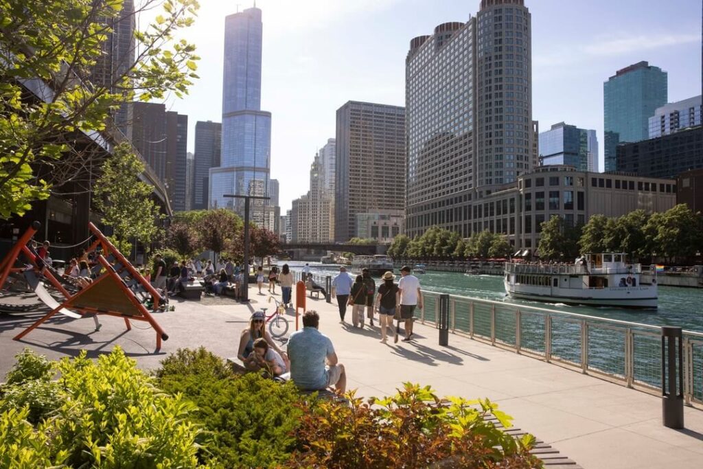 Visitors enjoying the Chicago Riverwalk during summer