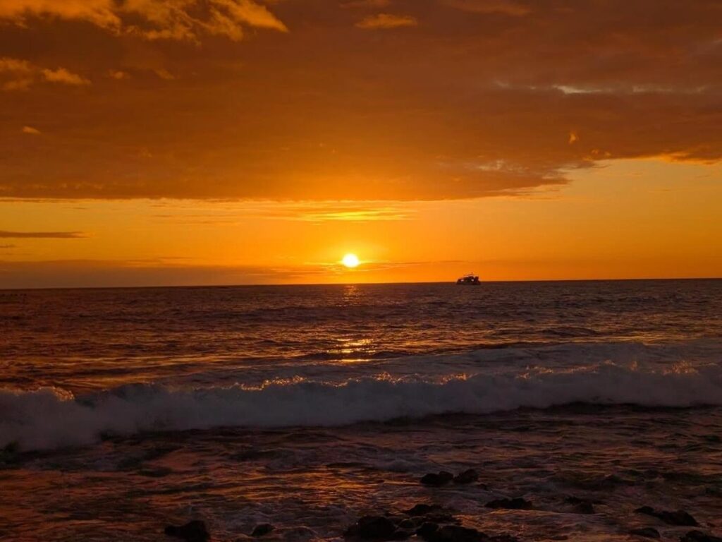 Sunset at Hāʻena State Park beach in Kauai